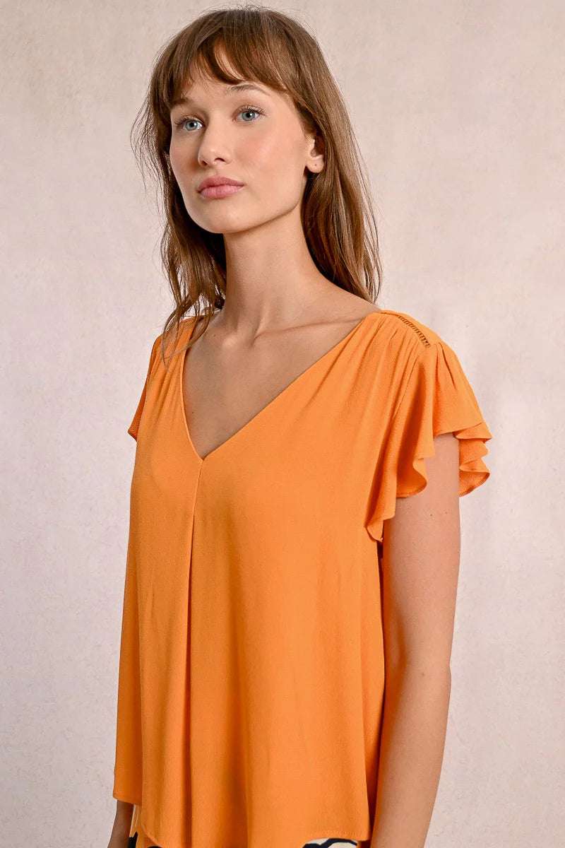 Orange Ruffled Cap Sleeve V-Neck Flowy Shirt Close View Pizzazz Beloit
